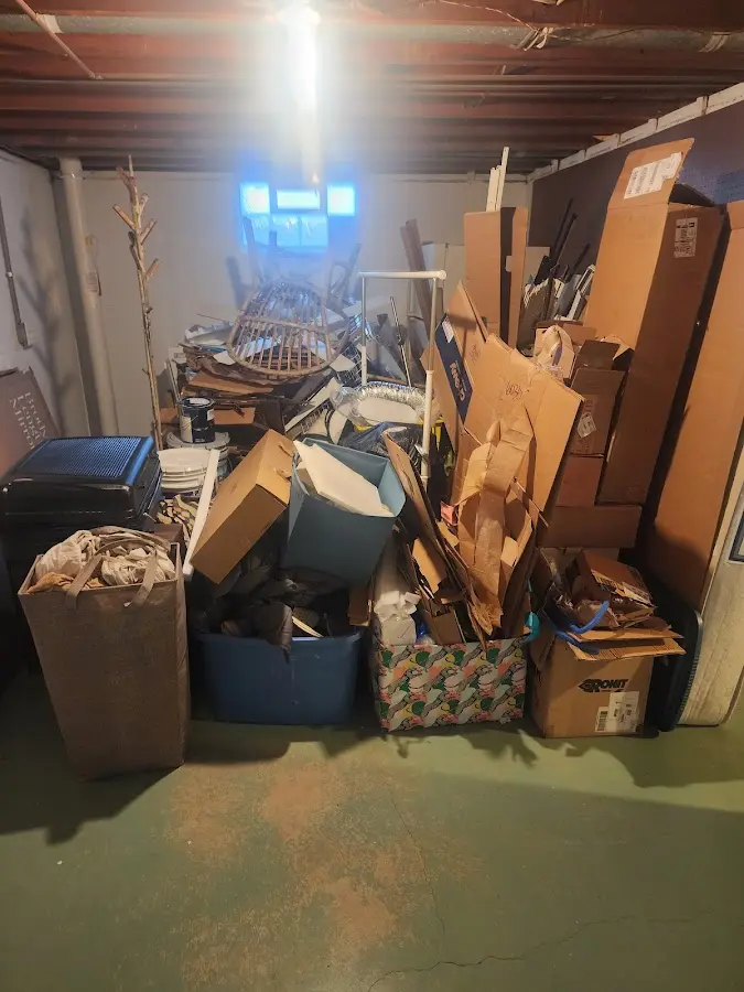 Roll-off dumpster container at job site for 6 Yard Dumpster Rental in Sandown